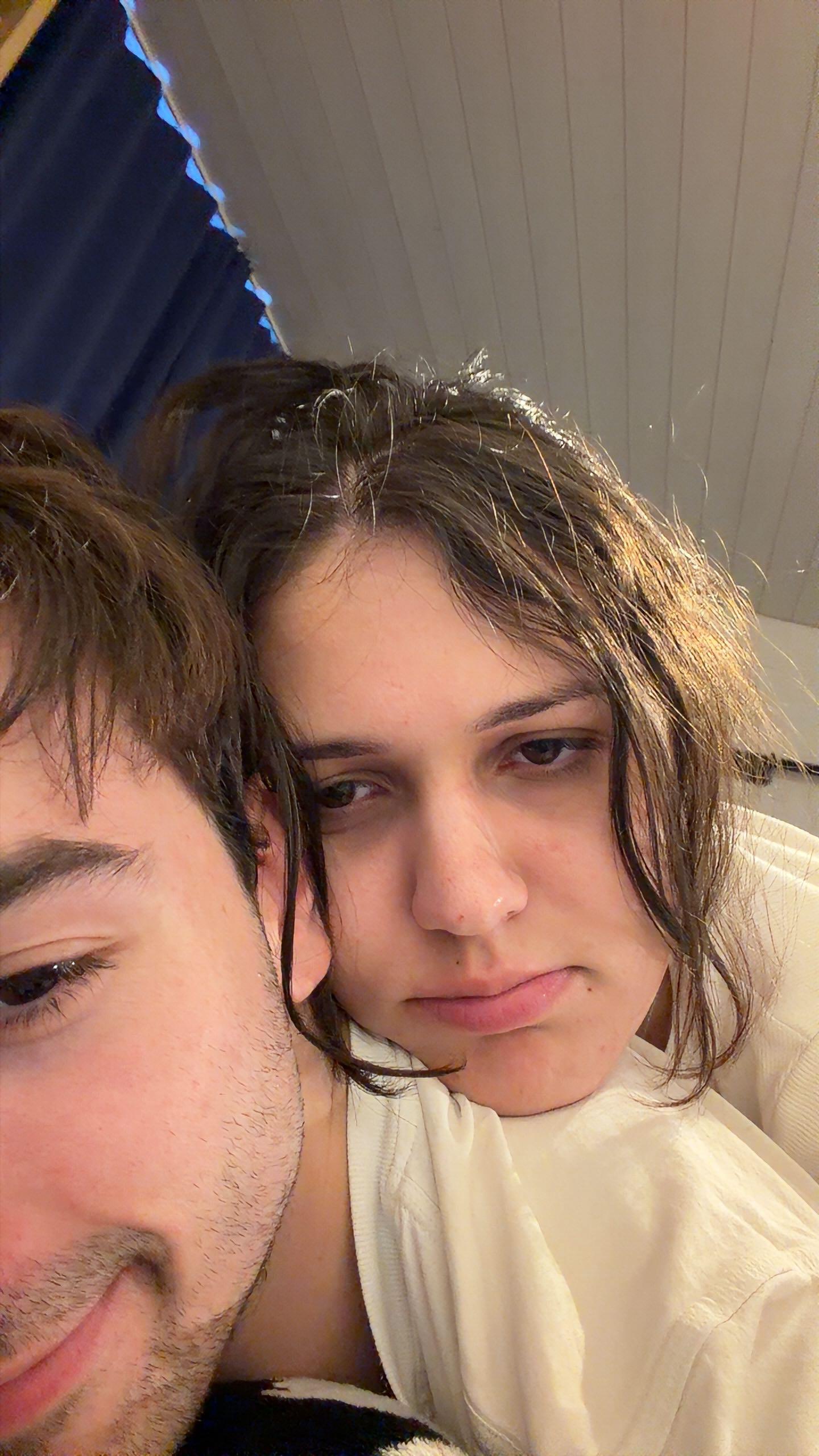 Asya and Jan with wet hair, unimpressed